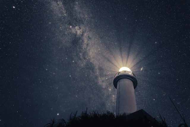 Astrology dictionary. Image of a lighthouse and the sky.